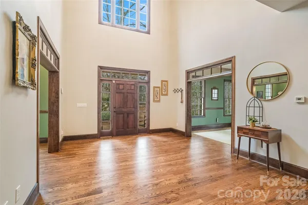 a view of a livingroom with furniture and wooden floor