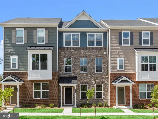 a front view of a house with yard
