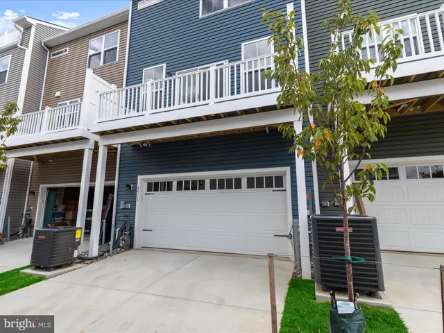a front view of a house with a porch