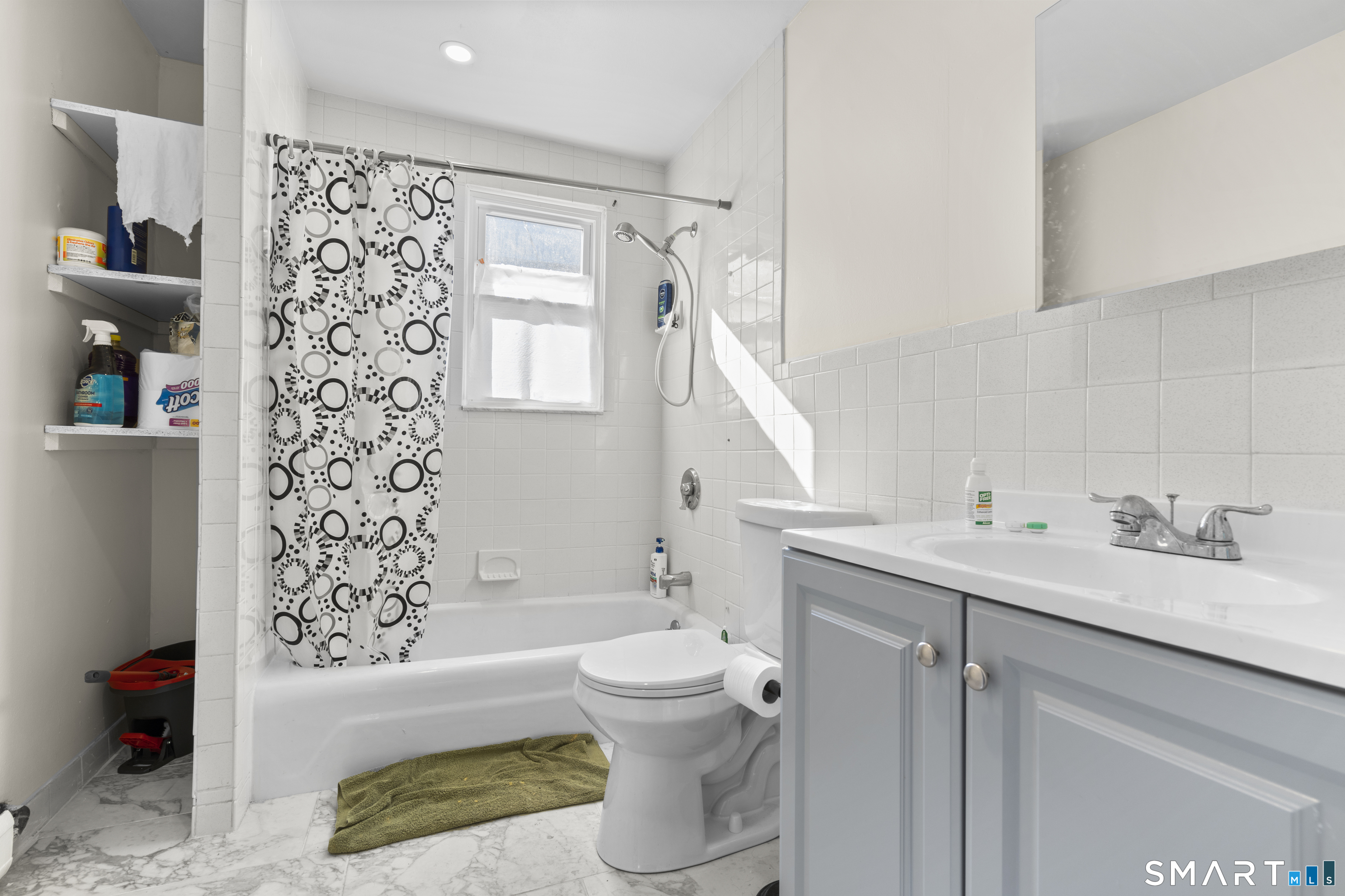 49-51 3rd Street Hamden, CT 06514 - Photo 13 of 40 a bathroom with a bathtub sink mirror toilet and a shower