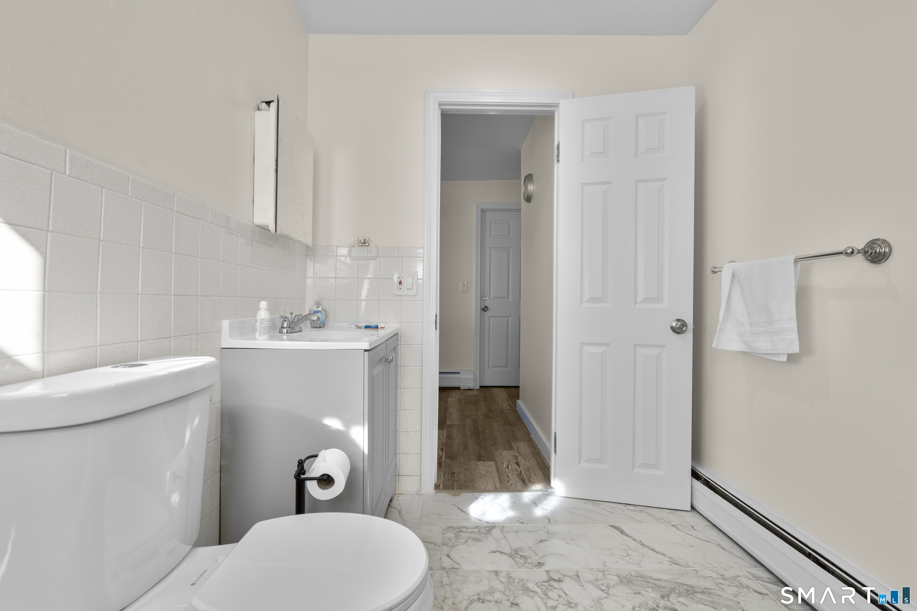 49-51 3rd Street Hamden, CT 06514 - Photo 14 of 40 a bathroom with a sink a toilet and shower