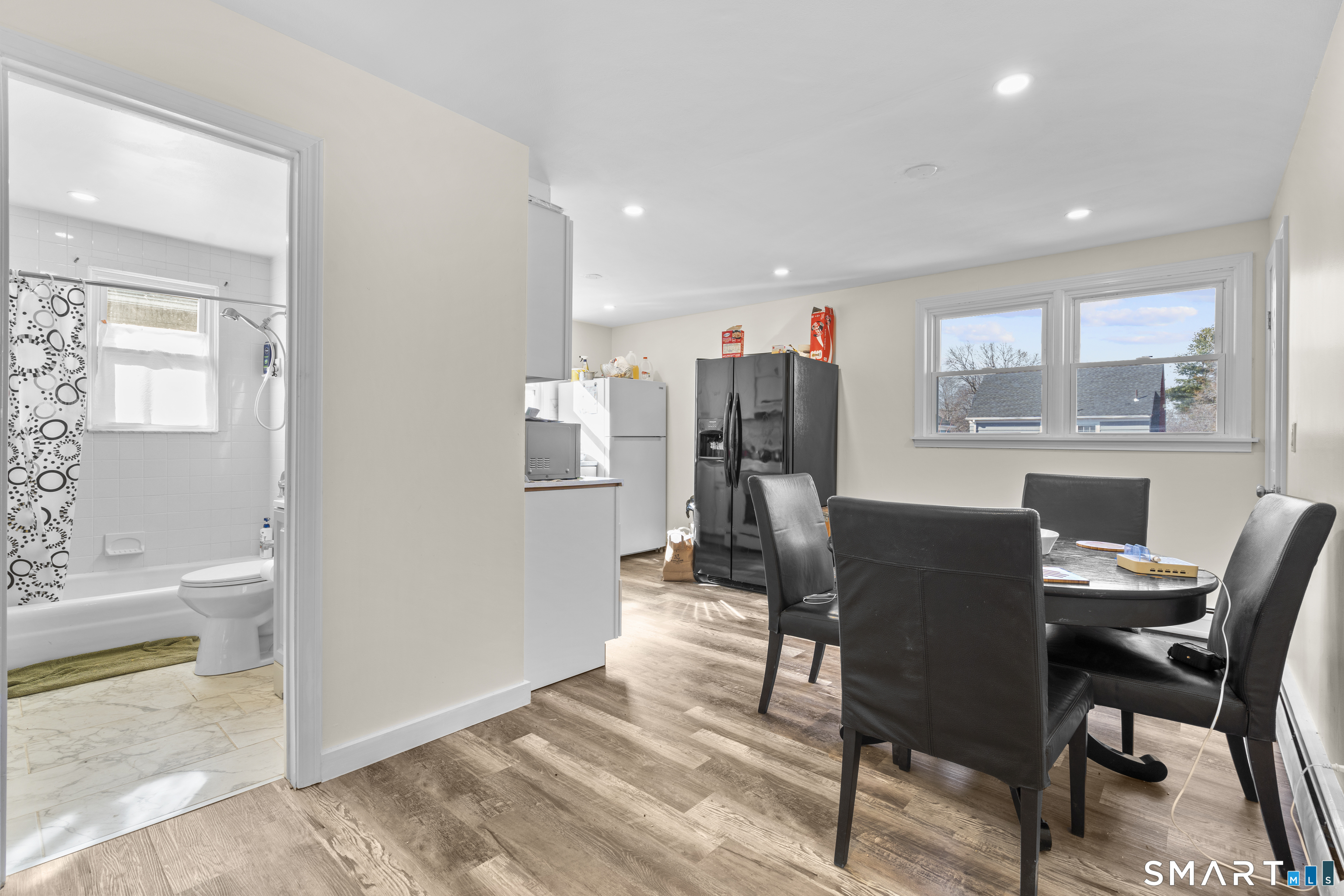 49-51 3rd Street Hamden, CT 06514 - Photo 15 of 40 a view of a dining room with furniture and window