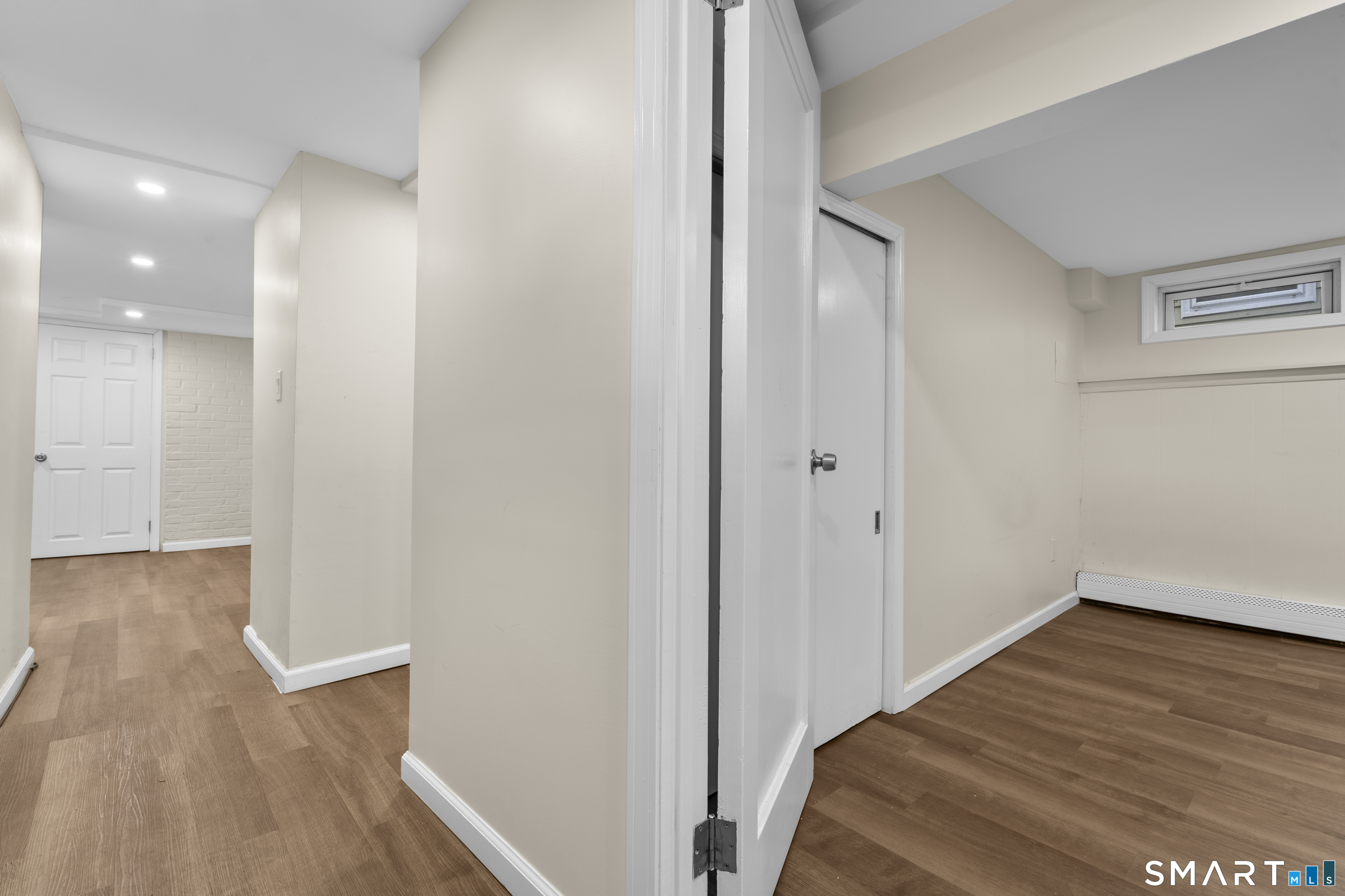 49-51 3rd Street Hamden, CT 06514 - Photo 24 of 40 a view of a hallway with wooden floor