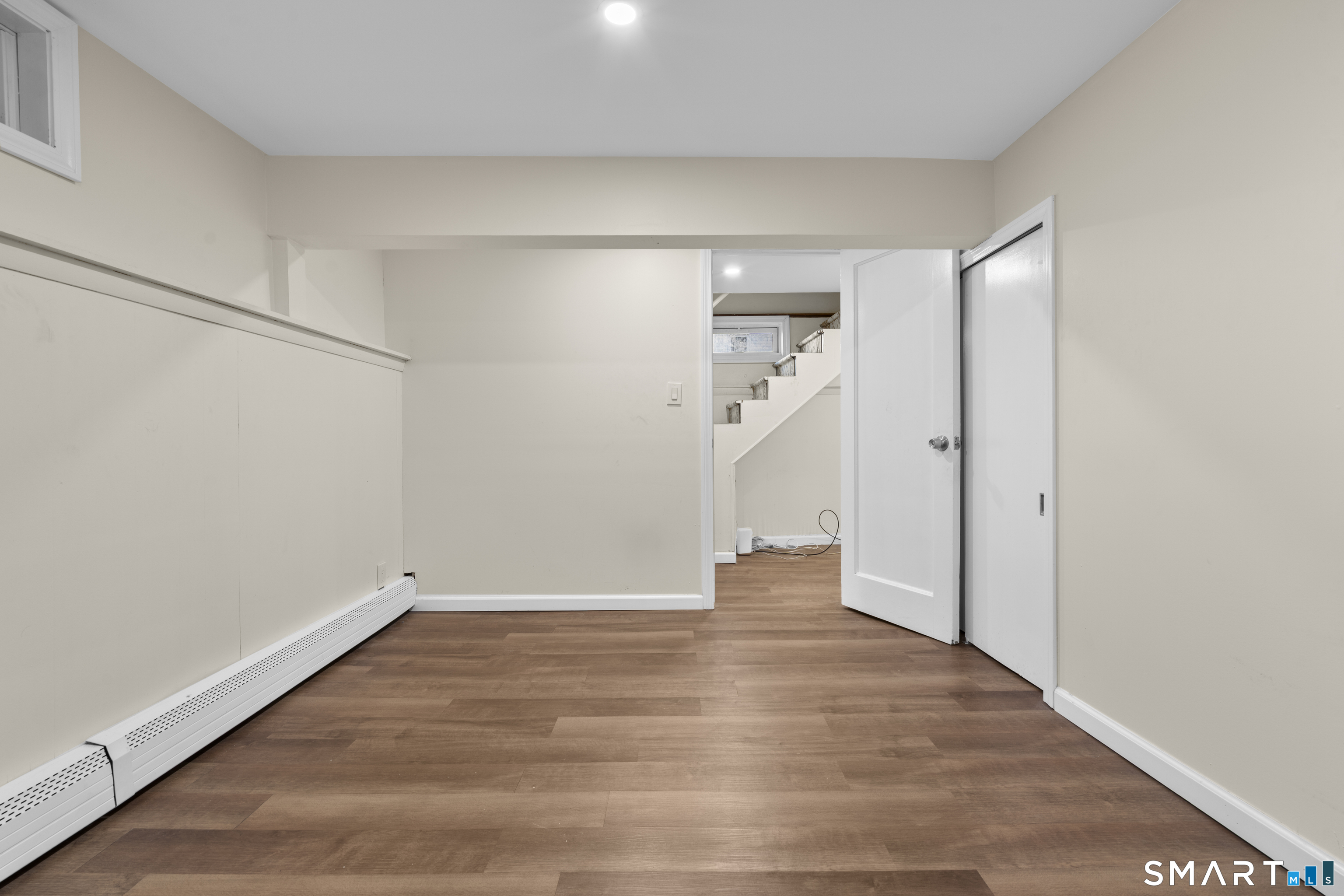 49-51 3rd Street Hamden, CT 06514 - Photo 26 of 40 a view of an empty room with wooden floor