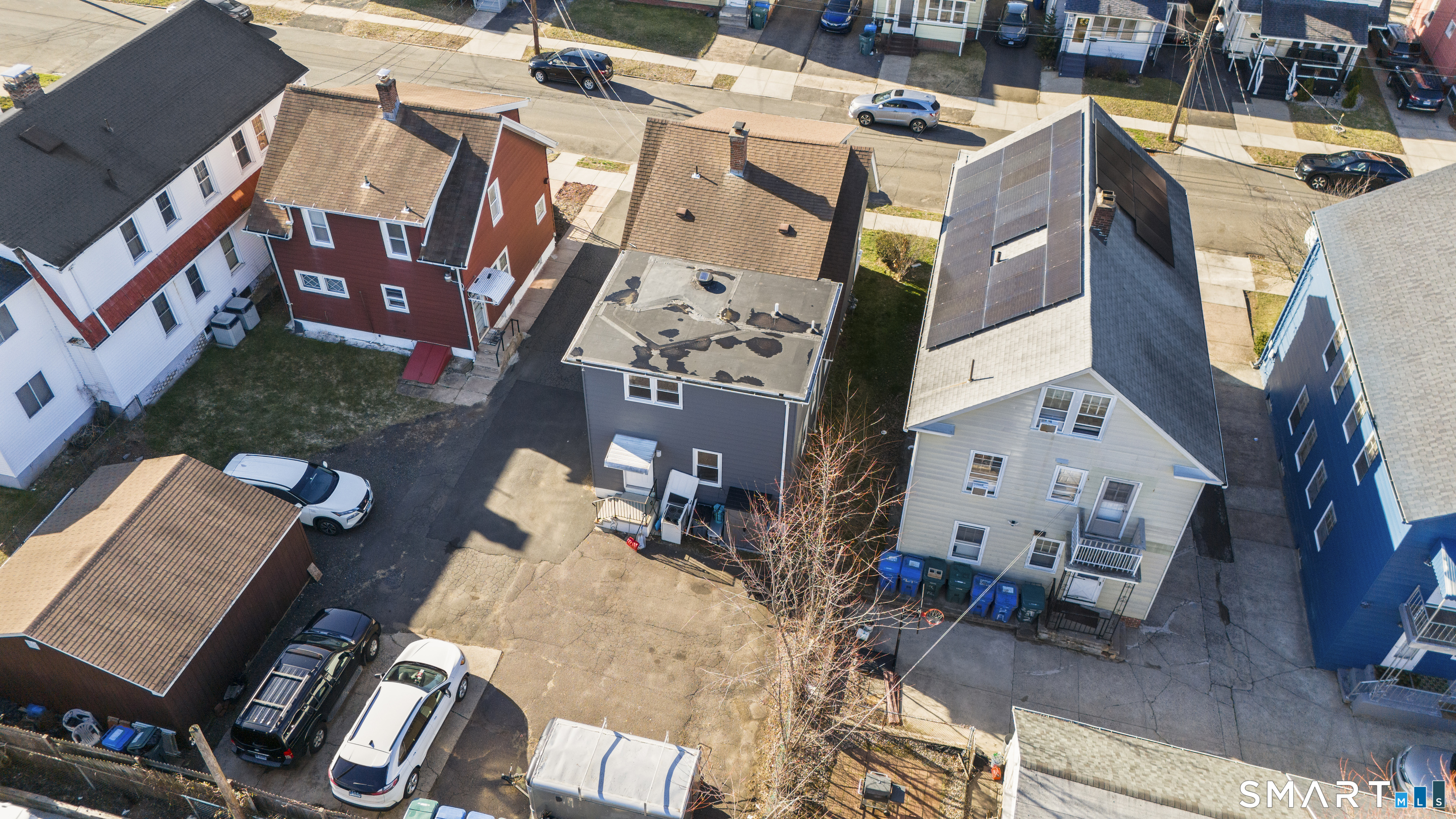 49-51 3rd Street Hamden, CT 06514 - Photo 38 of 40 an aerial view of residential houses with outdoor space