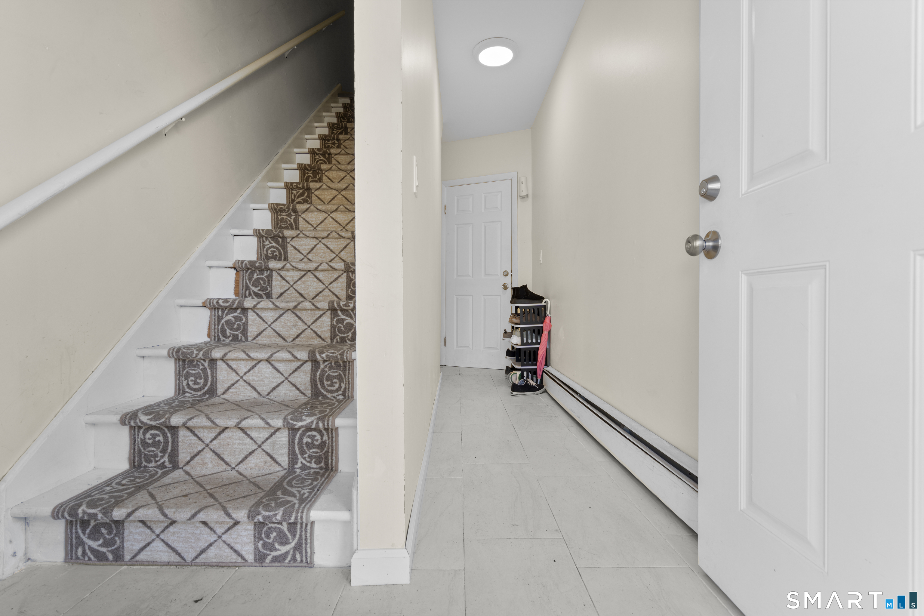 49-51 3rd Street Hamden, CT 06514 - Photo 6 of 40 a view of an entryway with staircase