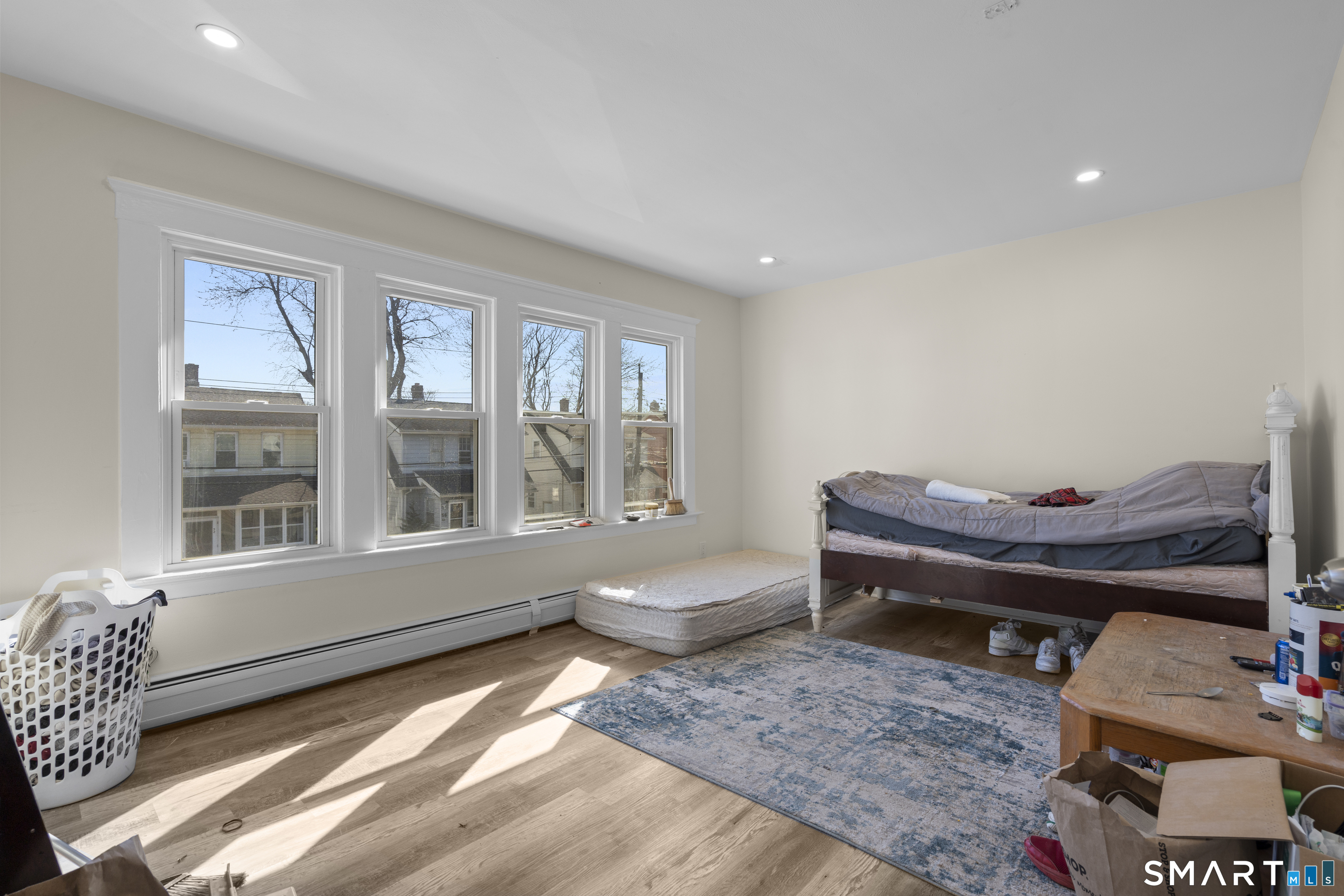 49-51 3rd Street Hamden, CT 06514 - Photo 9 of 40 a living room with furniture and a window