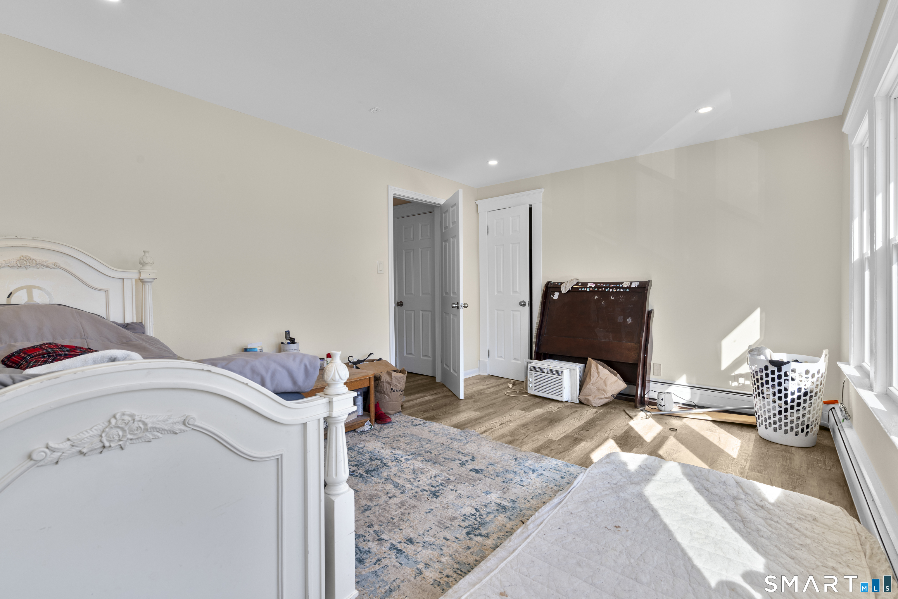 49-51 3rd Street Hamden, CT 06514 - Photo 10 of 40 a bedroom with a bed and a tv