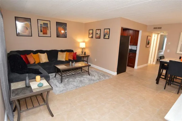 a view of a livingroom with furniture and a couch