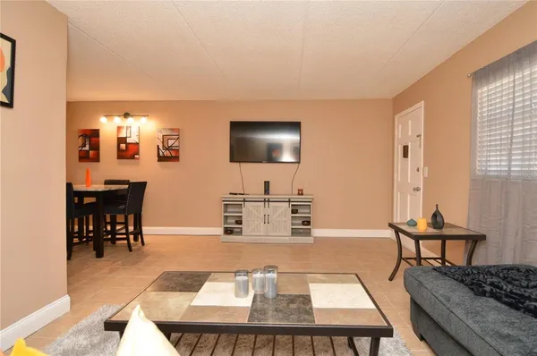 a bed room with a bed and a couch