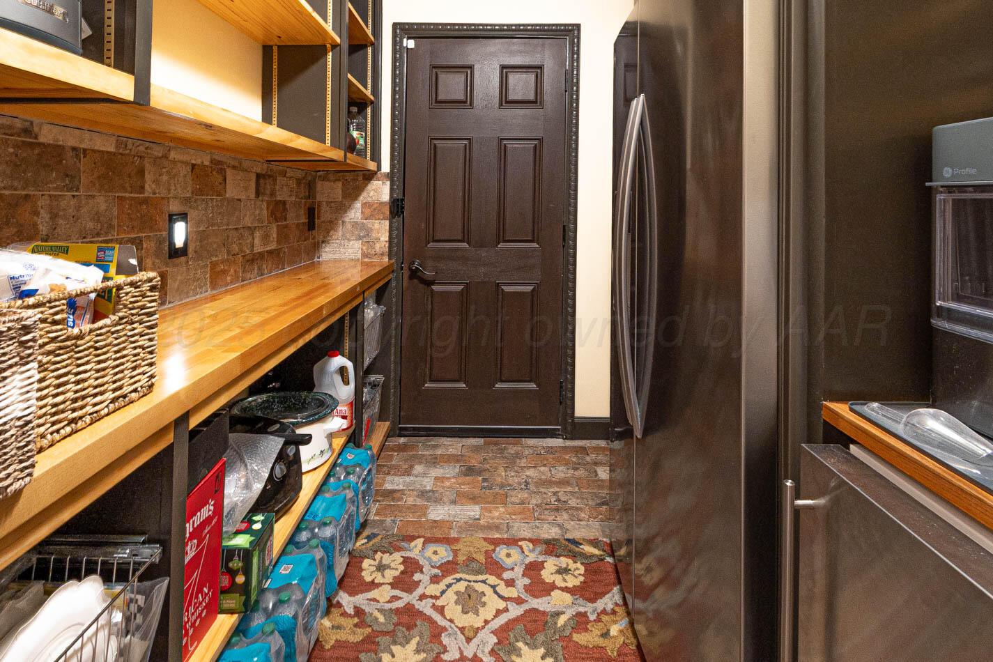 7724 Baughman Drive Amarillo, TX 79121 - Photo 24 of 52 Butler's Pantry