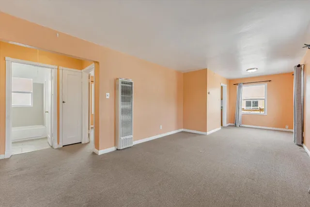 a view of an empty room with window