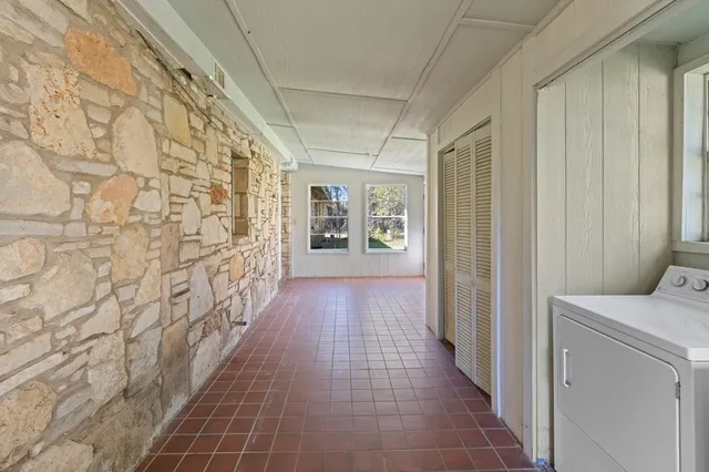 a hallway with windows