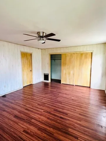 front view of a house with a garden