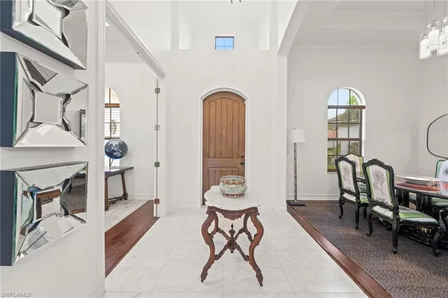 a view of a livingroom with furniture and a window