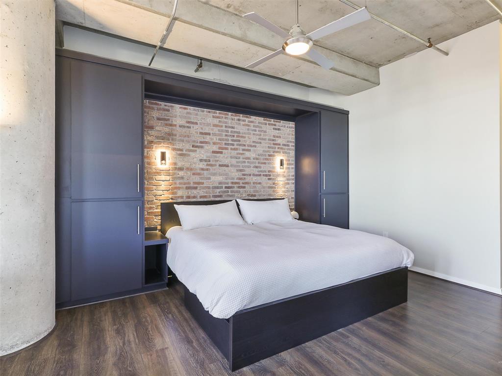 1001 Belleview Street, Unit 307 Dallas, TX 75215 - Photo 24 of 36 Custom built in storage surrounds this king sizebed
