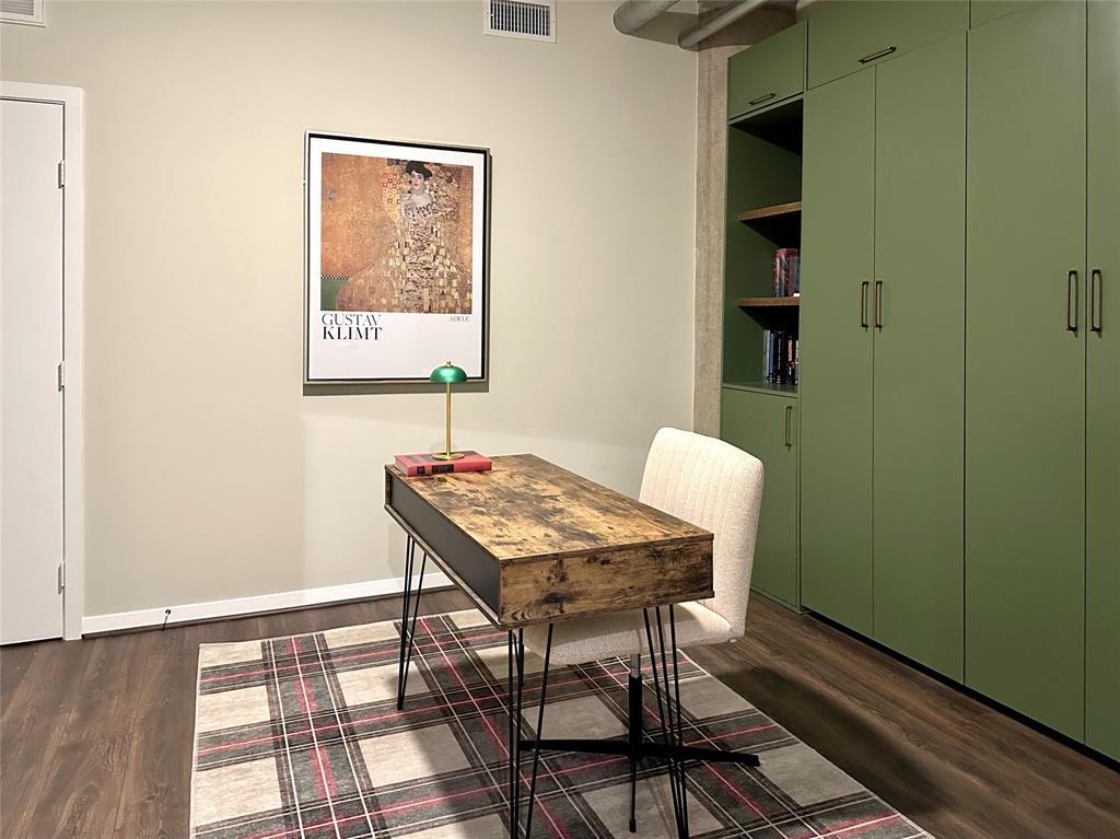 1001 Belleview Street, Unit 307 Dallas, TX 75215 - Photo 5 of 36 Walk in closet and custom queen size Murphy bedwith storage and shelving