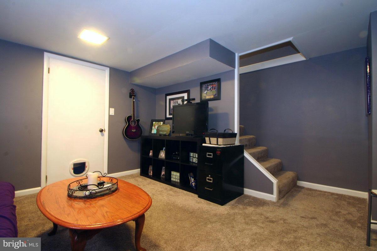 3529 Dunhaven Road Baltimore, MD 21222 - Photo 20 of 29 Finished lower level family room w Half bath