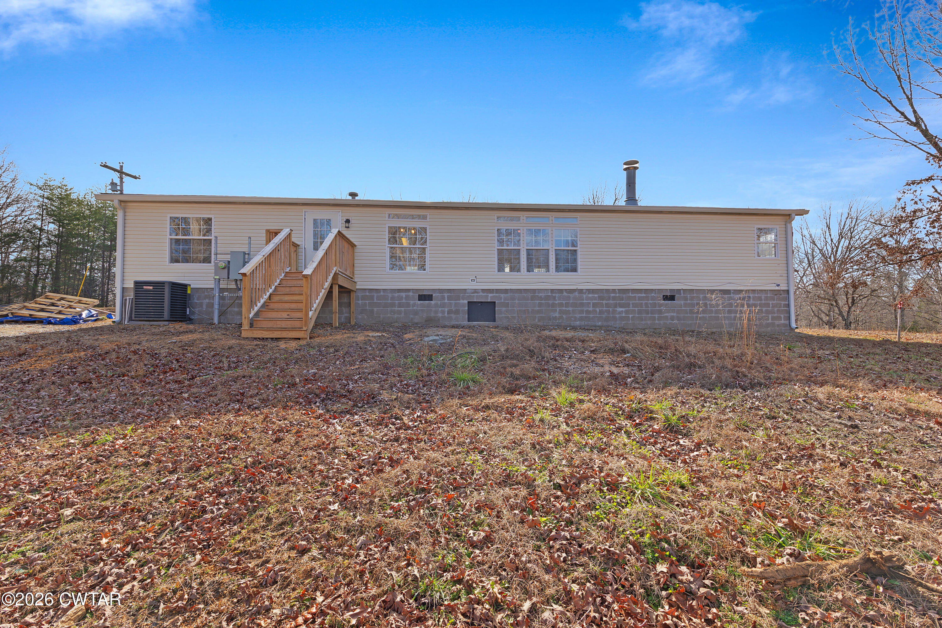 1920 Parkburg Road Medon, TN 38356 - Photo 3 of 17 a view of a house with a backyard