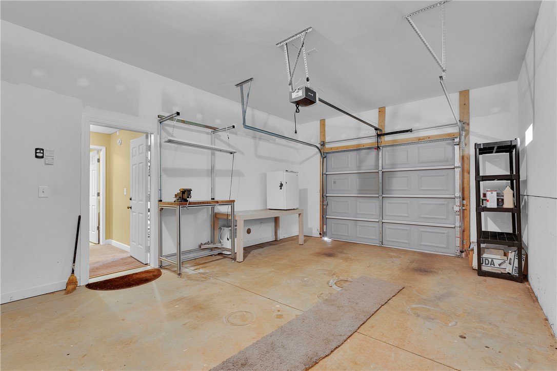 406 Hopewell Ridge Anderson, SC 29621 - Photo 36 of 46 This spacious garage offers ample storage and direct access to the home.