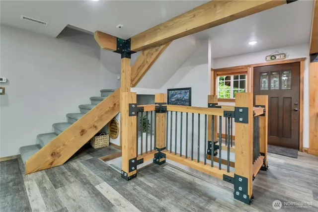 a view of a hallway with staircase