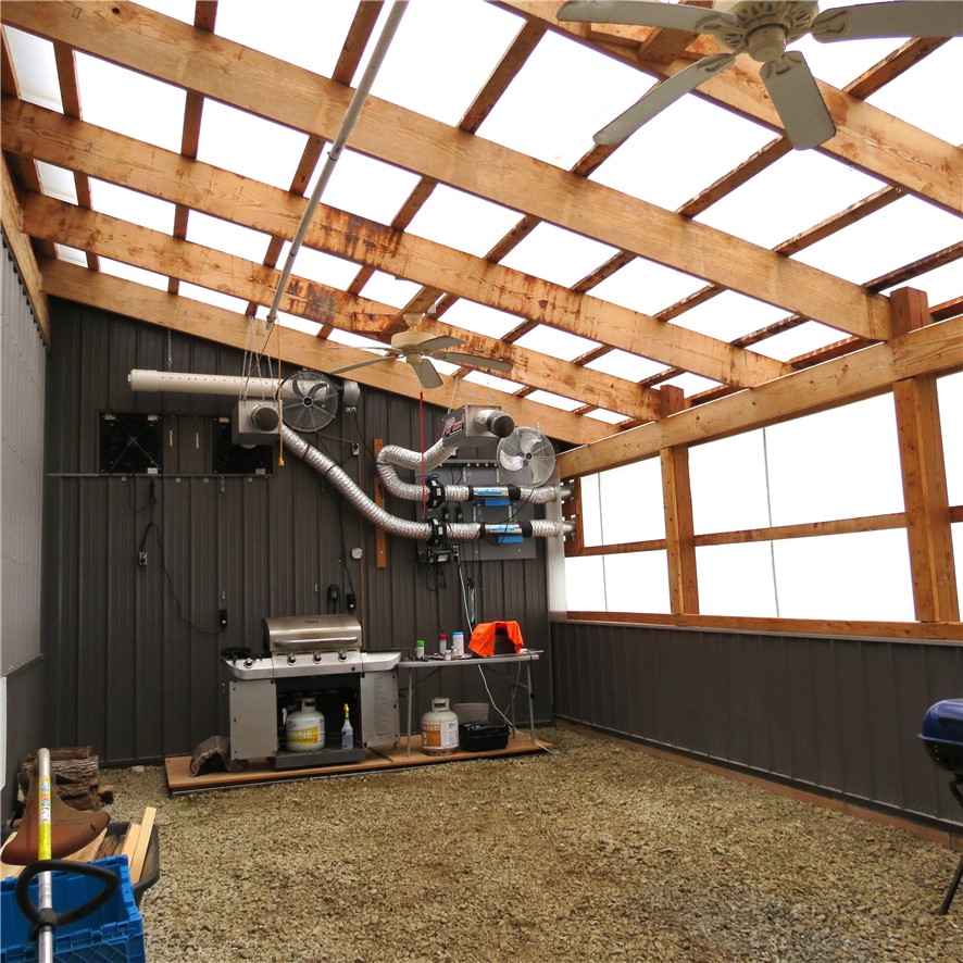 21242 Dingman-Slagle Road Pemberton, OH 45353 - Photo 29 of 33 This versatile structure offers an exceptional space for various activities, blending functionality with natural light.