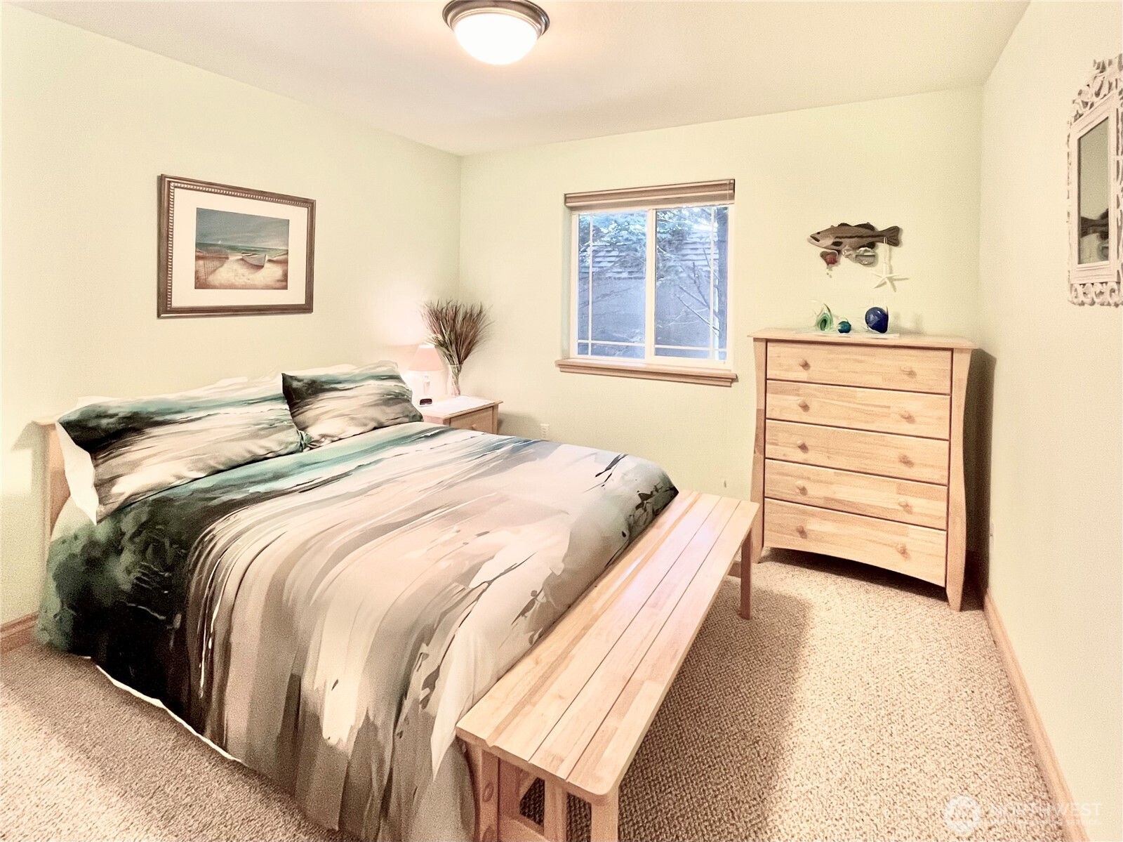 137 North Razor Clam Drive Southwest Ocean Shores, WA 98569 - Photo 13 of 31 a bedroom with a bed and a window