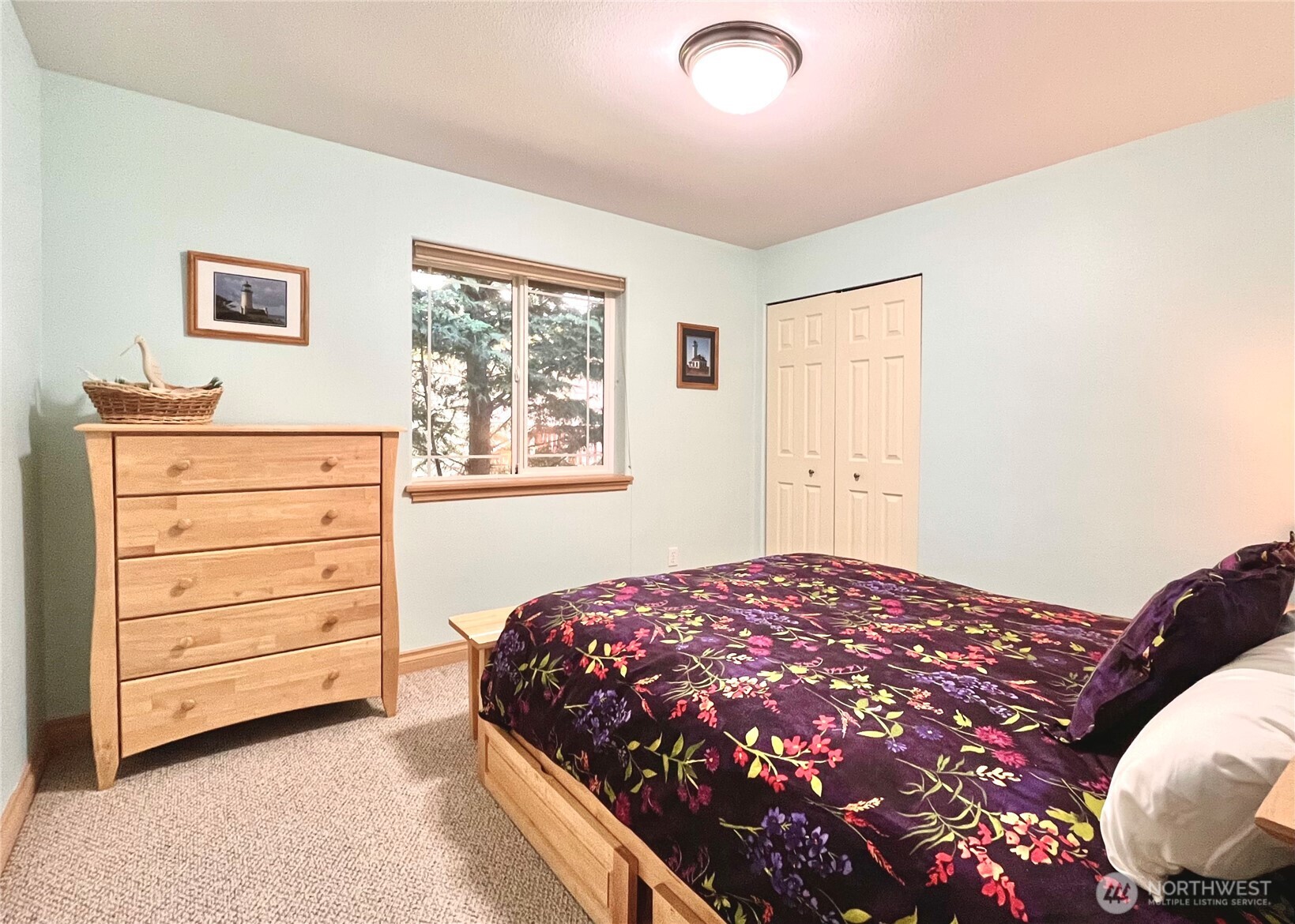 137 North Razor Clam Drive Southwest Ocean Shores, WA 98569 - Photo 15 of 31 a bedroom with a bed and a dresser