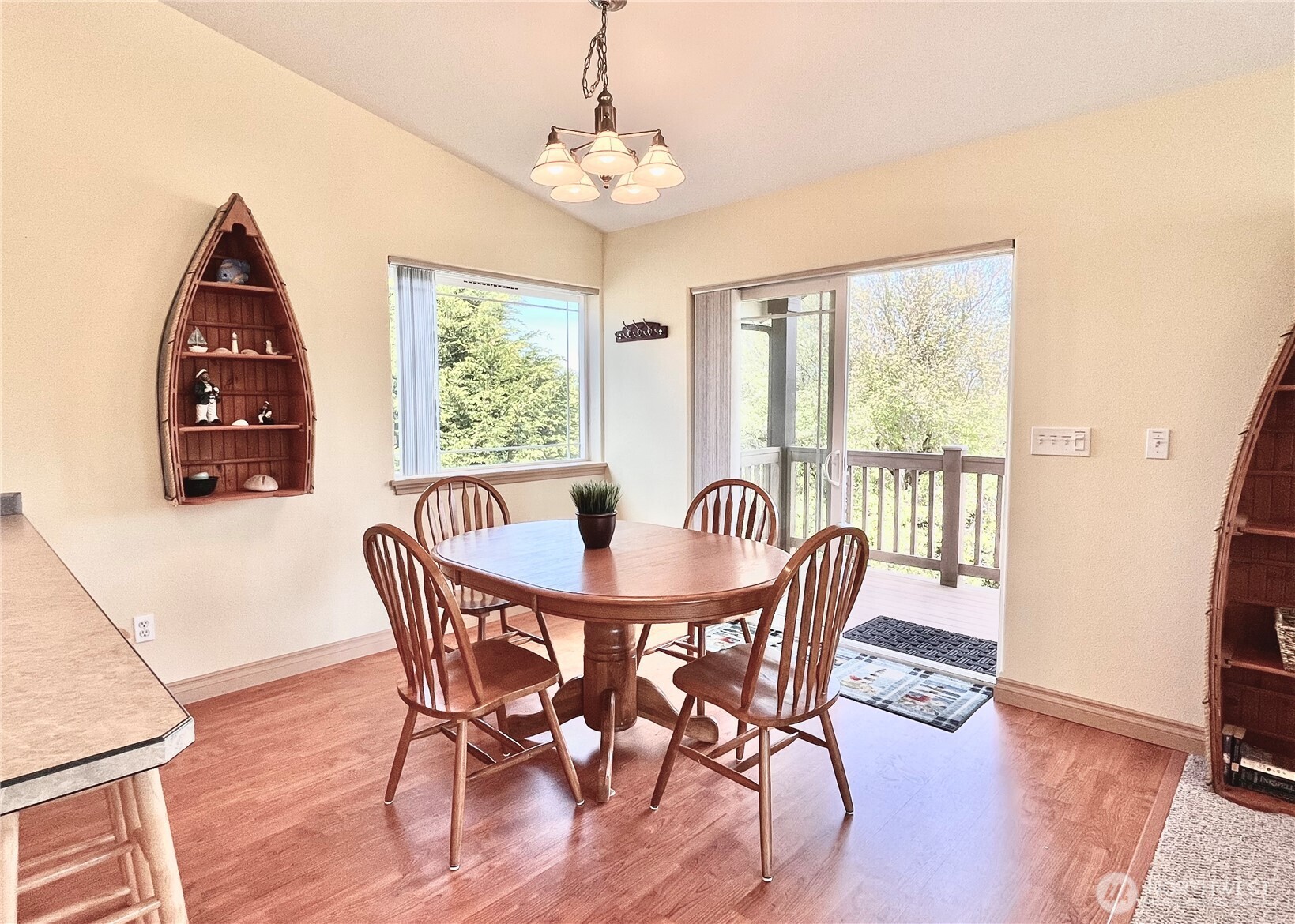 137 North Razor Clam Drive Southwest Ocean Shores, WA 98569 - Photo 23 of 31 a view of a dining room with furniture window and wooden floor
