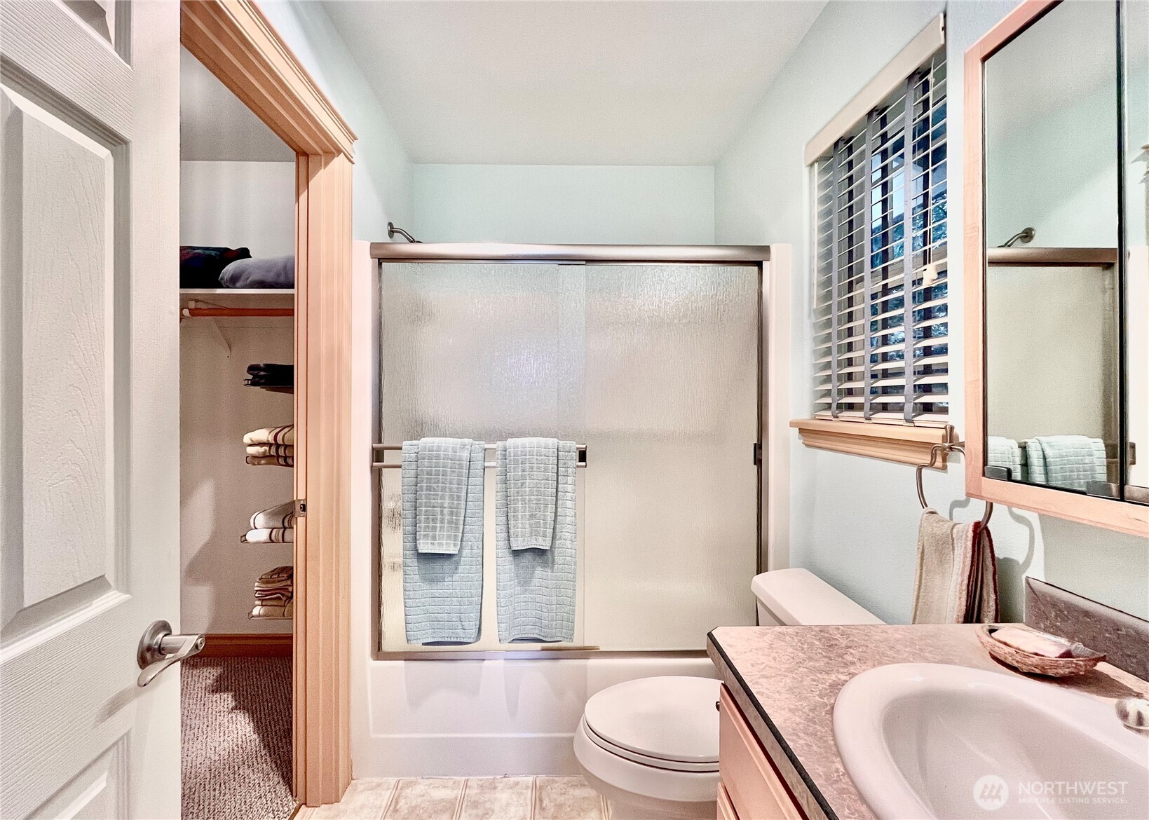 137 North Razor Clam Drive Southwest Ocean Shores, WA 98569 - Photo 26 of 31 a bathroom with a sink toilet and shower
