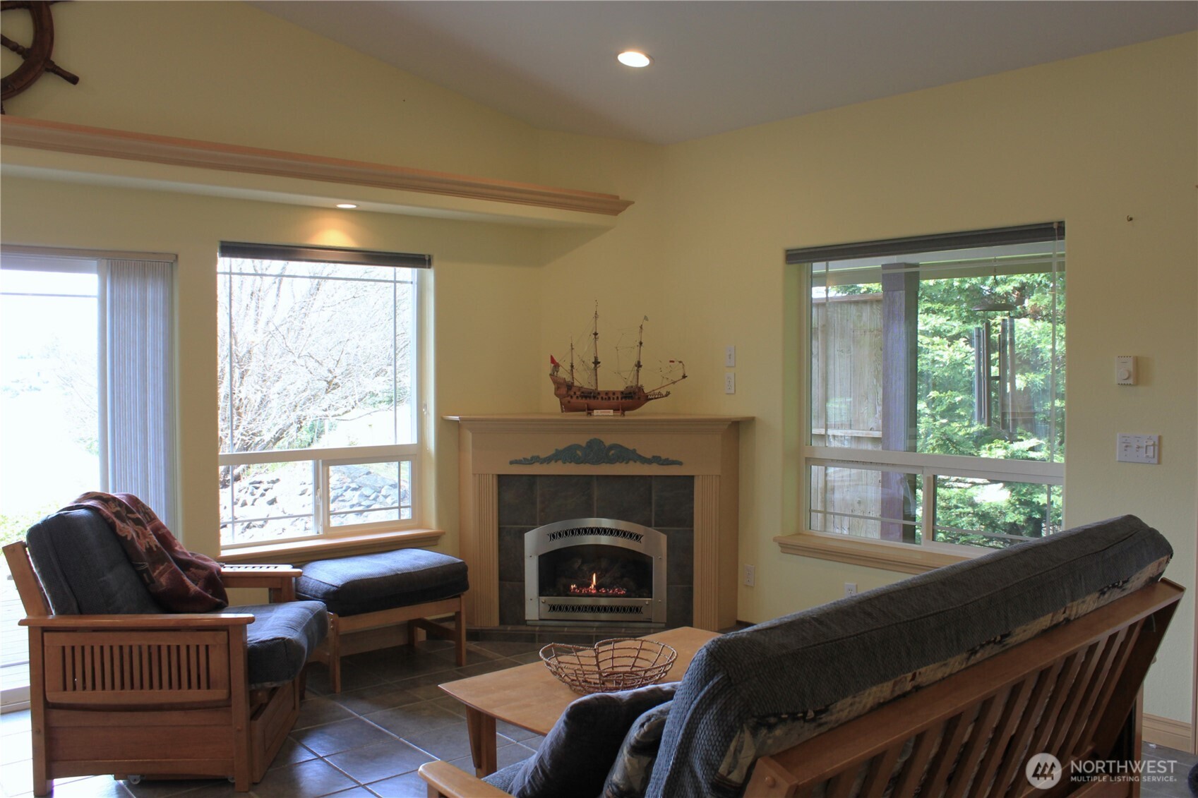 137 North Razor Clam Drive Southwest Ocean Shores, WA 98569 - Photo 8 of 31 a living room with furniture and a fireplace