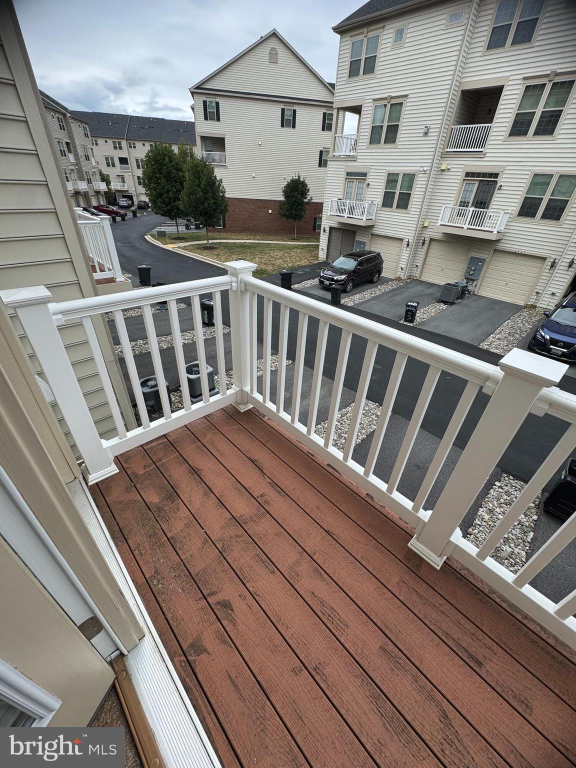 6436 Walcott Lane Frederick, MD 21703 - Photo 20 of 27 a view of balcony with wooden floor