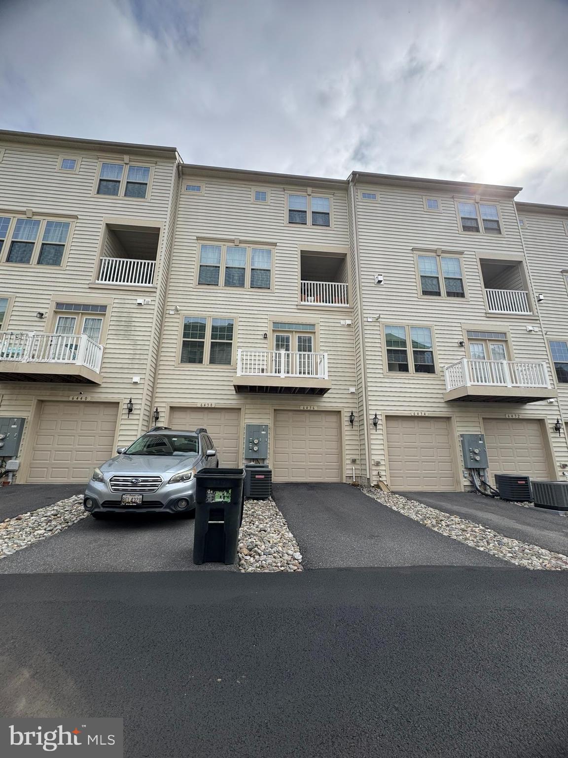 6436 Walcott Lane Frederick, MD 21703 - Photo 26 of 27 a car parked in front of a building