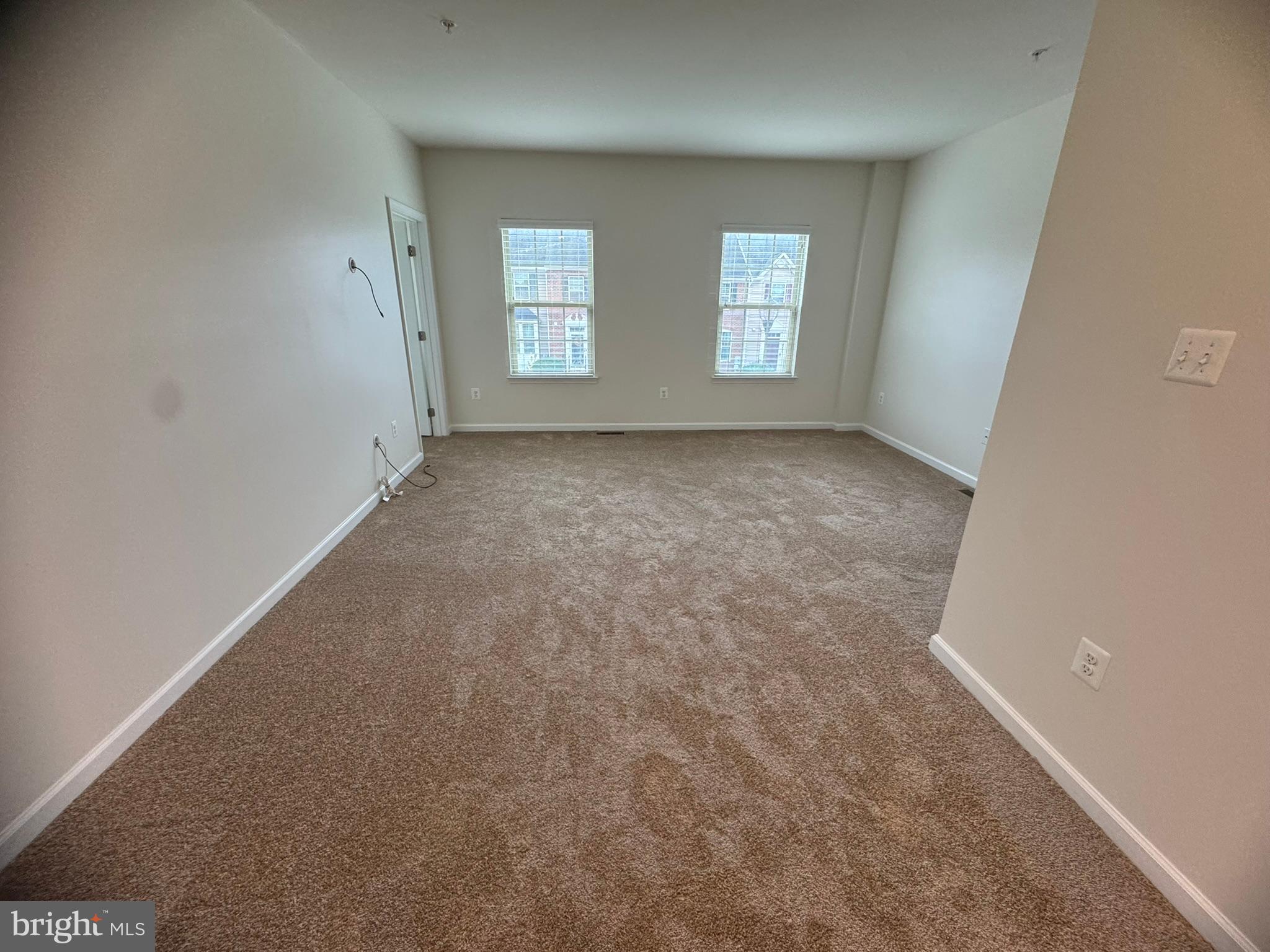 6436 Walcott Lane Frederick, MD 21703 - Photo 8 of 27 an empty room with windows