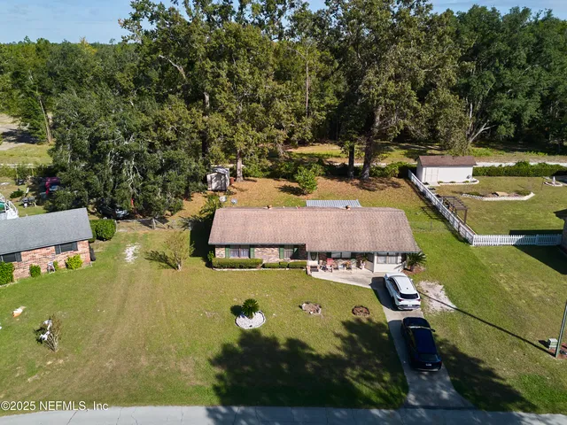 a view of a swimming pool with lounge chair
