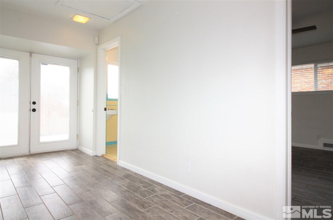 1280 Tacoma Way Reno, NV 89509 - Photo 13 of 36 a view of a hallway with wooden floor