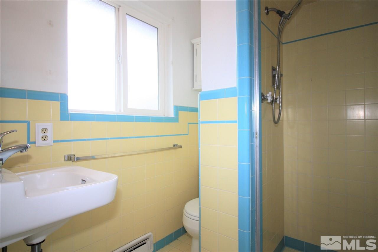 1280 Tacoma Way Reno, NV 89509 - Photo 17 of 36 a bathroom with a sink and a tub