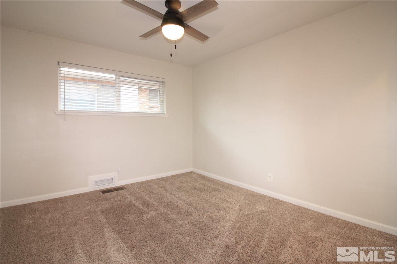 1280 Tacoma Way Reno, NV 89509 - Photo 20 of 36 an empty room with a window