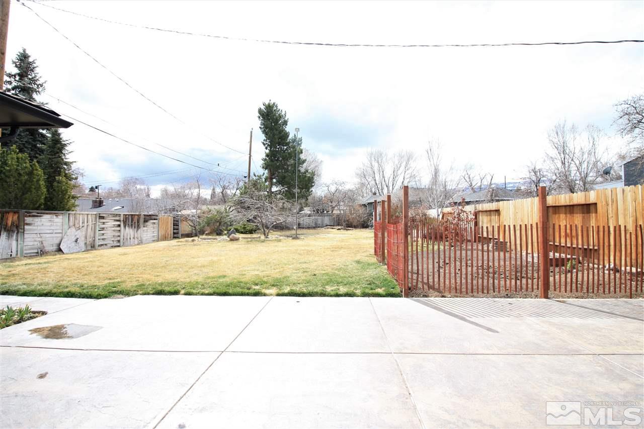 1280 Tacoma Way Reno, NV 89509 - Photo 24 of 36 a view of a yard with wooden fence