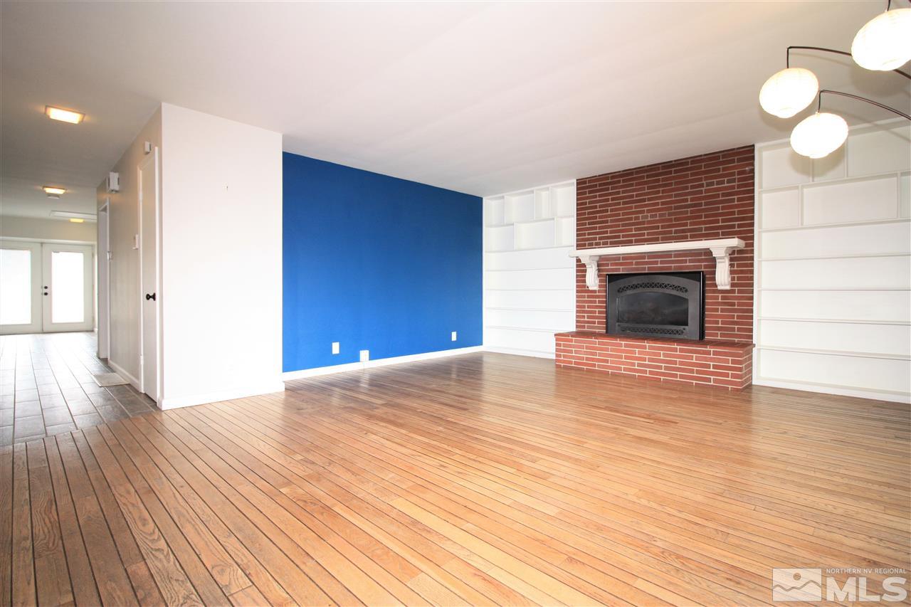 1280 Tacoma Way Reno, NV 89509 - Photo 3 of 36 a view of empty room with wooden floor