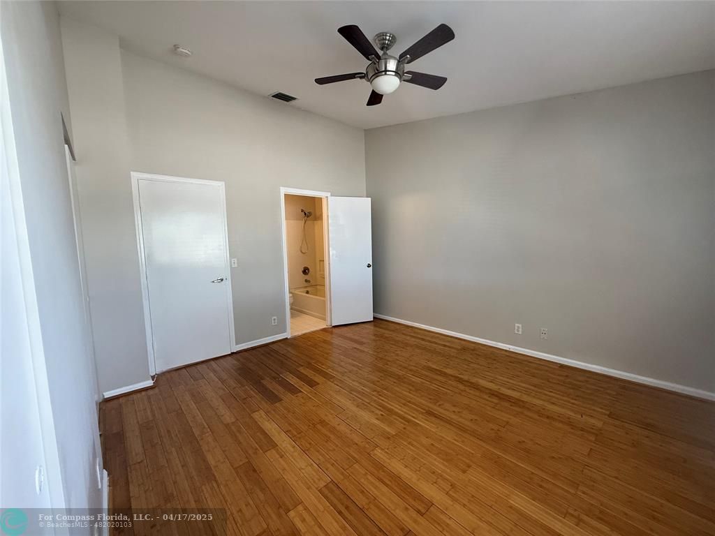 5295 Jamboree Place Margate, FL 33063 - Photo 29 of 35 a view of empty room with wooden floor