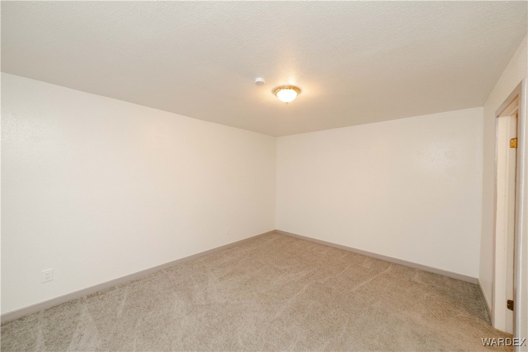 6846 Mormon Flat Road Golden Valley, AZ 86413 - Photo 20 of 50 Master Bedroom