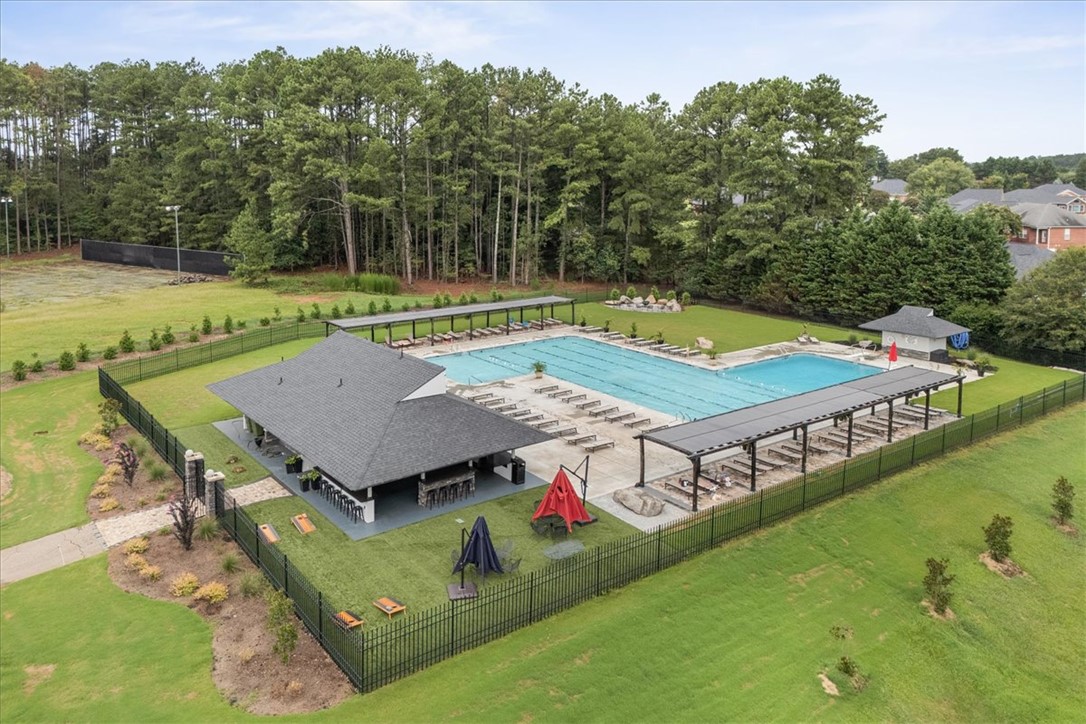 119 Shipyard Circle Anderson, SC 29621 - Photo 48 of 50 An aerial perspective reveals the community's Jr Olympic salt water pool, surrounded by lush lawns and a wooded grounds.