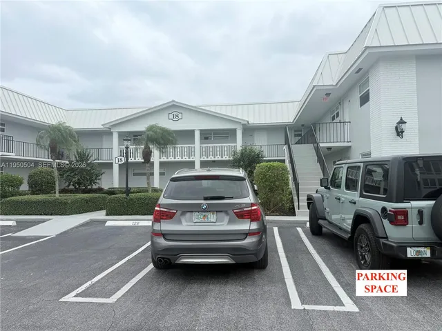 $239,900 | 18 Colonial Club Drive, Unit 202, Boynton Beach, FL 33435
