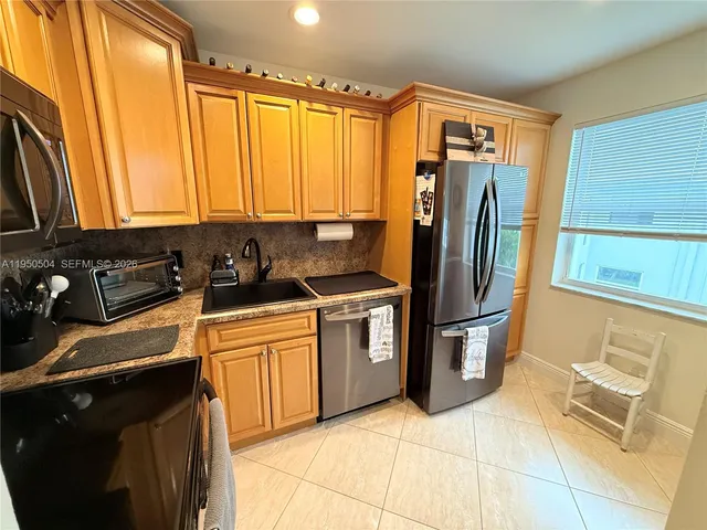 $239,900 | 18 Colonial Club Drive, Unit 202, Boynton Beach, FL 33435