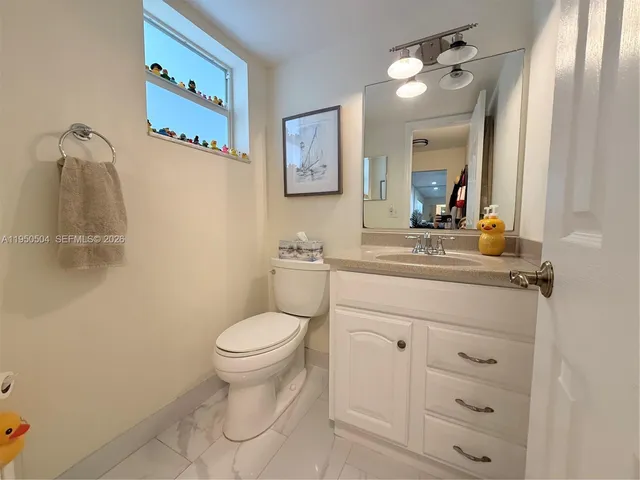 $239,900 | 18 Colonial Club Drive, Unit 202, Boynton Beach, FL 33435