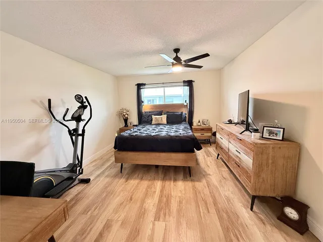 $239,900 | 18 Colonial Club Drive, Unit 202, Boynton Beach, FL 33435