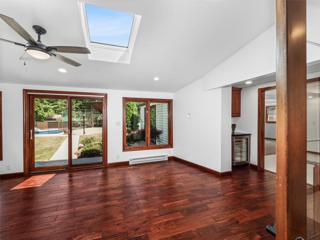 2350 Morrow Road Pittsburgh, PA 15241 - Photo 23 of 49 a view of an empty room with wooden floor and a window