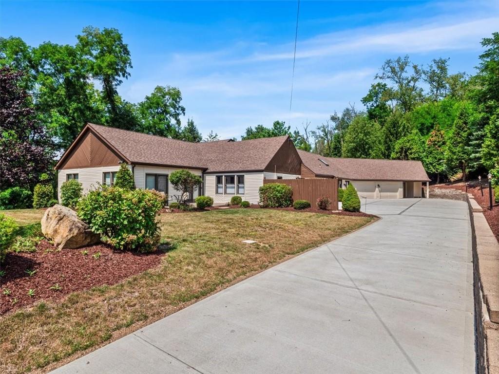 2350 Morrow Road Pittsburgh, PA 15241 - Photo 4 of 49 a front view of a house with a yard