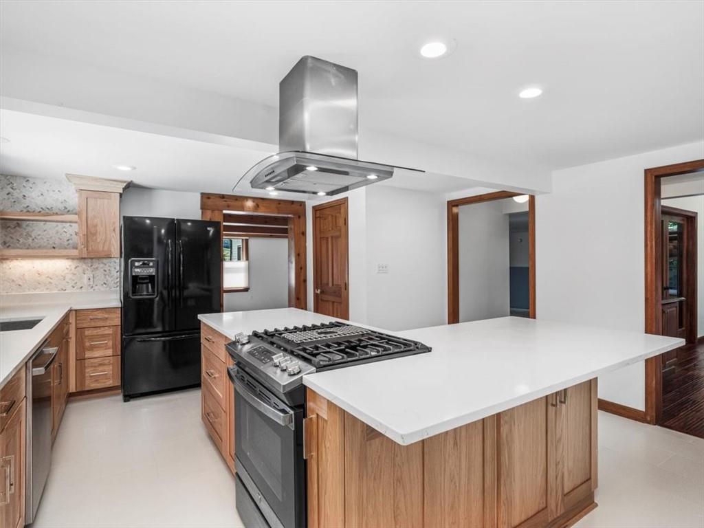 2350 Morrow Road Pittsburgh, PA 15241 - Photo 6 of 49 a kitchen with stainless steel appliances a stove and refrigerator